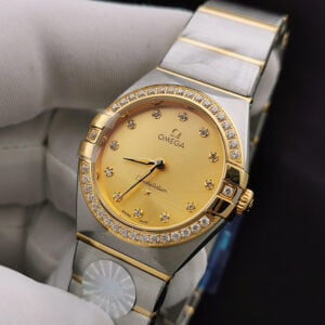 ĐỒNG HỒ NỮ OMEGA CONSTELLATION MẶT VÀNG ĐÍNH ĐÁ REPLICA 28MM 2 dong ho nu omega constellation mat vang dinh da replica 28mm 1 1