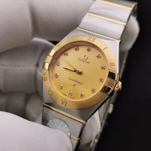 ĐỒNG HỒ NỮ OMEGA CONSTELLATION MẶT VÀNG TRƠN REPLICA 28MM 2 dong ho nu omega constellation mat vang tron replica 28mm 2 1