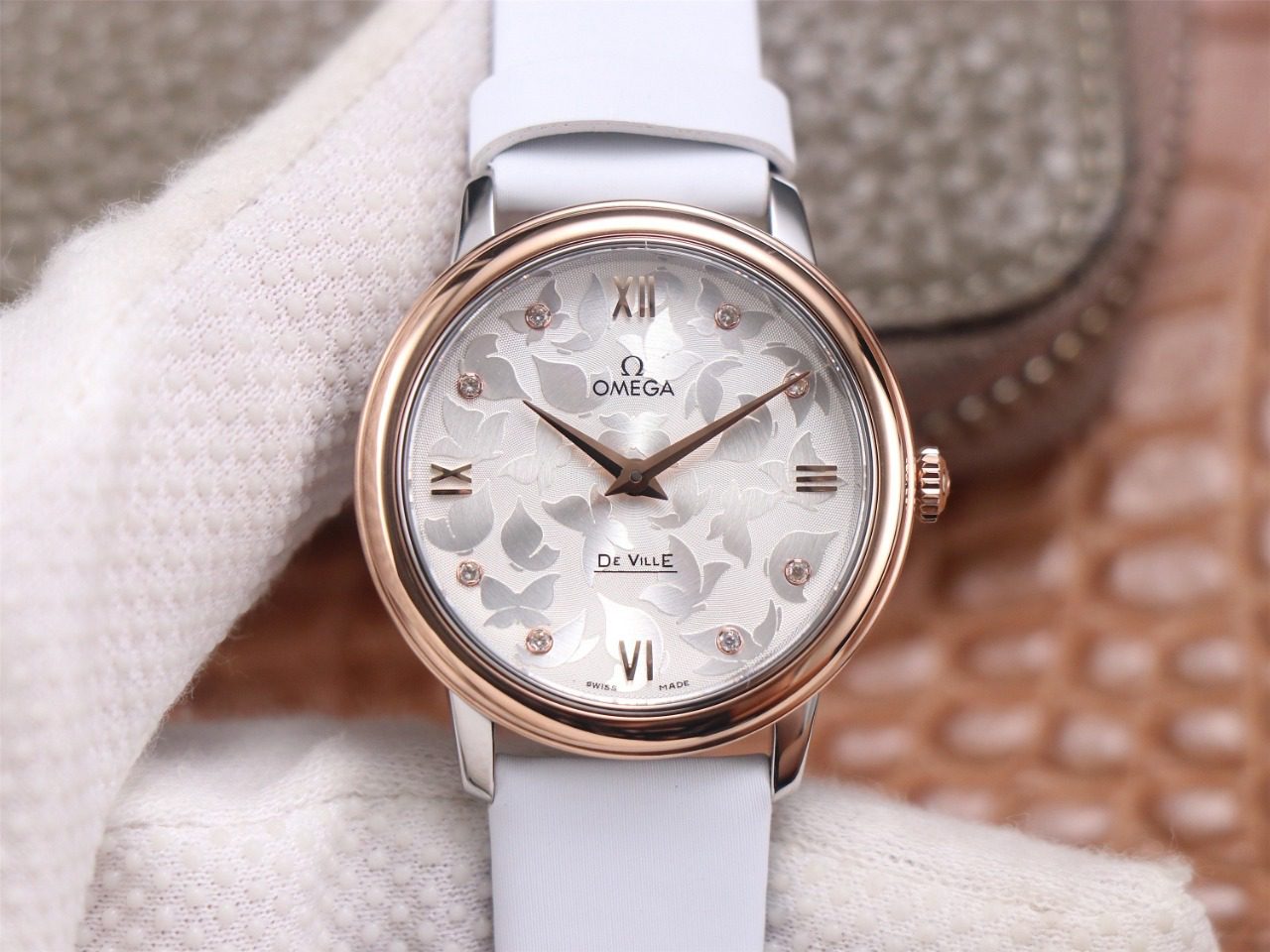 dong-ho-nu-omega-de-ville-vien-mau-hong-replica-327mm-1 dong ho nu omega de ville vien mau hong replica 327mm 1