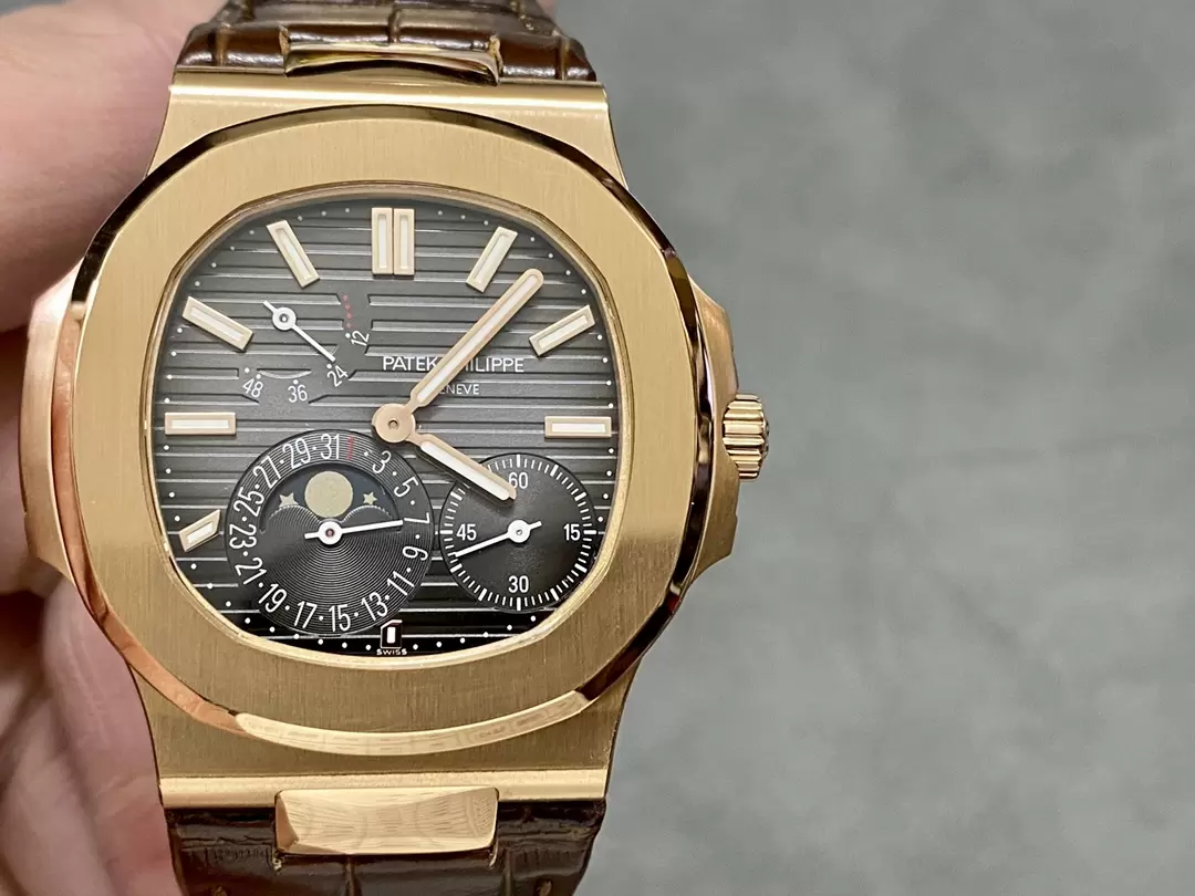 ĐỒNG HỒ PATEK PHILIPPE NAUTILUS 5712 ROSE GOLD REP 11 PPF FACTORY 40MM (1) ĐỒNG HỒ PATEK PHILIPPE NAUTILUS 5712 ROSE GOLD REP 11 PPF FACTORY 40MM (2)