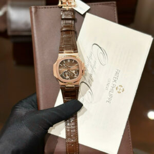 ĐỒNG HỒ PATEK PHILIPPE NAUTILUS 5712 REPLICA 1:1 BỌC VÀNG DÂY DA NÂU 40MM 1 ĐỒNG HỒ PATEK PHILIPPE NAUTILUS 5712 REPLICA 11 BỌC VÀNG DÂY DA NÂU 40MM
